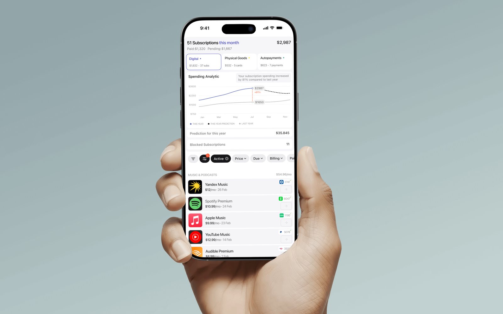 Banking app on a phone in a hand: the subscriptions screen with spending analytics